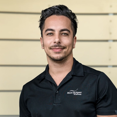 Transformational Life Coach Torrance CA Giovanni Cardoso 1 Giovanni Cardoso smiling in a black shirt.
