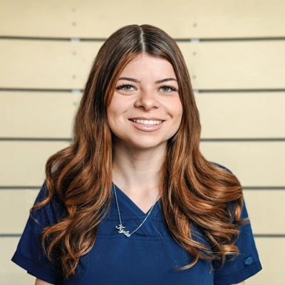 Transformational Life Coach Torrance CA Kylie Smith Kylie Smith smiling in a blue shirt.